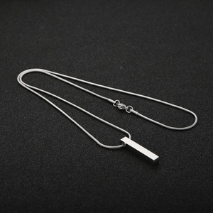Minimalist silver stainless steel bar pendant necklace with a sleek snake chain design