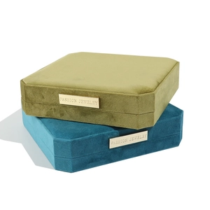 Octagonal velvet jewelry boxes in olive green and peacock blue for pearl necklaces