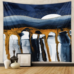 Detail of mountain tapestry with abstract moon hanging on a modern minimalist grey wall