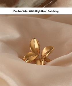 Macro detail of high polished 316L stainless steel petal ring with 18K gold PVD plating