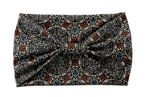 Detail of tribal geometric print headband with a stylish knot on soft fabric material