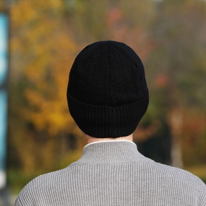 Men's black winter cable knit beanie with thick fleece lining for cold weather warmth
