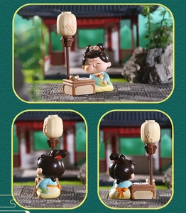 Detailed views of Tang style lady resin figurine with desk and lantern accessories