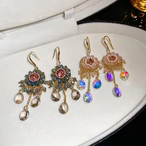 Bohemian floral tassel earrings with colorful crystals and intricate beadwork details