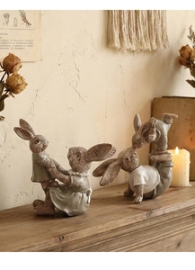 Detailed resin rabbit figurines featuring creative dancing and balancing acrobatic poses