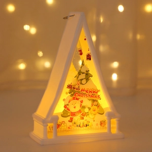 Macro detail of white LED Christmas lantern showing festive scene with soft bokeh effect