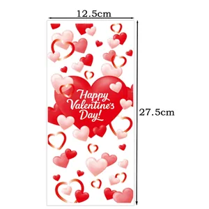 Close-up of Happy Valentine's Day candy bags with red heart patterns, 12.5x27.5 cm size