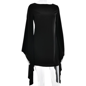Detail of elegant black mini dress featuring dramatic wide flared sleeves and smooth texture