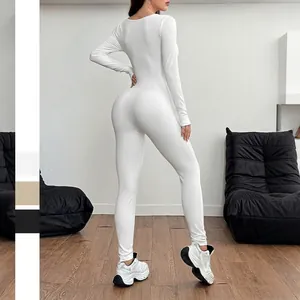 Women's white long sleeve ribbed yoga bodysuit jumpsuit with high elasticity back view