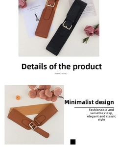 Detail of wide elastic waist belts with metal pin buckle in black and brown faux leather