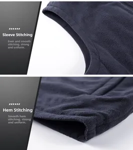 Detailed macro view showing professional flatlock stitching on dark grey fleece fabric vest