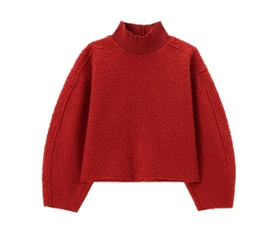 Detailed texture of red long-sleeved turtleneck sweatshirt in cozy fleece material
