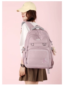 Detail of light purple waterproof backpack with multiple zip pockets and JLD logo