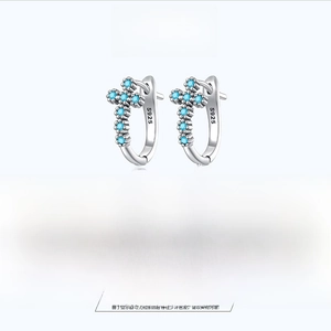 Detail view of S925 sterling silver cross hoop earrings with blue zircon and dimensions