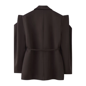 Rear view of women's dark blazer featuring structured shoulder pads and waist belt detail