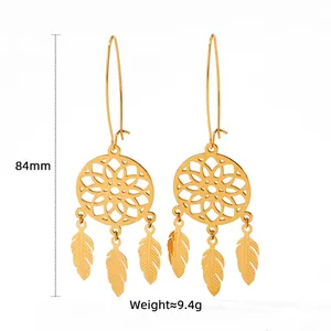 Gold dreamcatcher dangle earrings with feather pendants in bohemian style, 84mm height