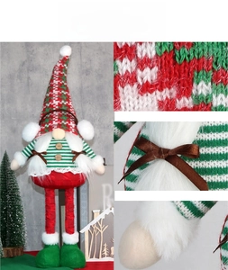 Detailed close-up of Christmas gnome plush doll featuring plaid hat and knit fabric textures