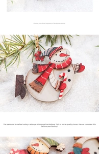 Close-up of a vintage wooden snowman ornament with festive red scarf in a snowy scene