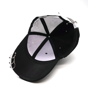 Black and white hip-hop baseball cap with silver rings and premium cotton texture