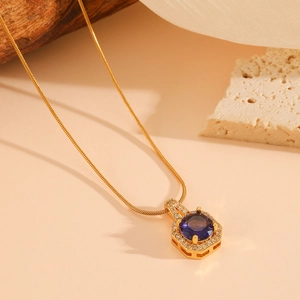 Gold stainless steel snake chain necklace with octagonal blue gemstone pendant for women