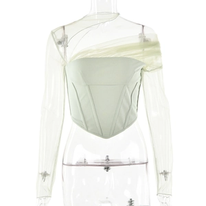 Top a corsetto verde chiaro attillato con maniche lunghe in mesh trasparente su bianco