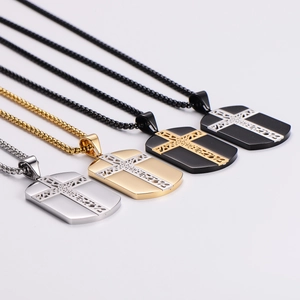 Set of four stainless steel cross military tags in gold, silver, and black finishes