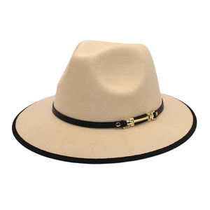 Detail of beige wool fedora hat with black trim edge and gold buckle decorative band