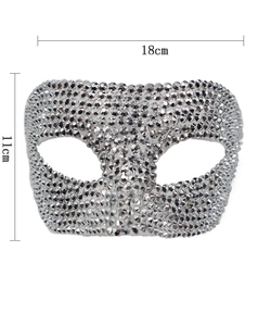 Close-up of sparkling silver rhinestone masquerade mask showing 18cm by 11cm dimensions
