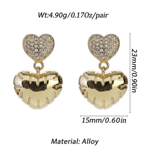 Detail showing dimensions of heart earrings with zircon micro-pave and vertical texture