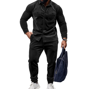Detail of premium black faux suede texture on men's casual jacket with double chest pockets