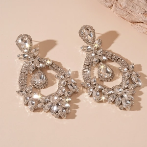 Luxury silver teardrop earrings with crystals and hollow floral design for party