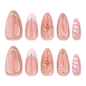 Pink french croc nails with 3D floral accents and glitter for a sweet almond manicure