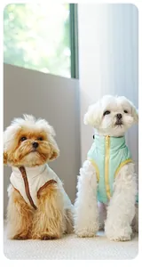Detail of a contrasting bubble texture vest with a color-block zipper for small dogs