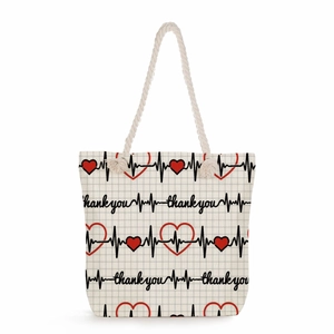 Nurse themed tote bag featuring red hearts and black EKG lines with thank you text
