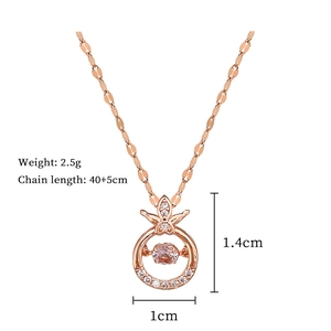 Close-up of rose gold Pipa pendant with dancing stone and sparkling zircon details
