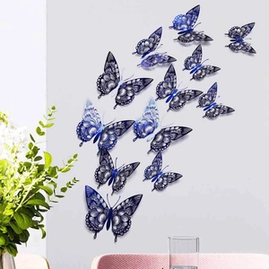 Detailed view of 12 blue hollow butterfly wall stickers on a light gray home wall decor