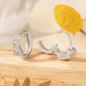 Silver bow-knot hoop earrings with sparkling cubic zirconia inlay for women and girls