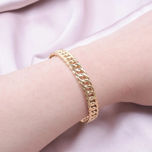 Elegant 18k gold plated titanium steel adjustable open bangle on purple silk