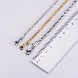 Macro detail of gold and silver twisted rope chains in 2mm 3mm 4mm with ruler scale