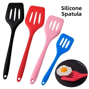 Close-up of silicone slotted spatulas in four colors with integrated hanging hole design