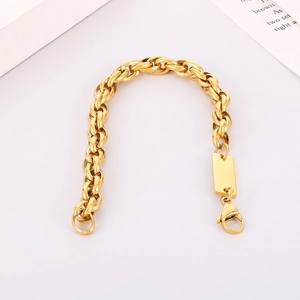 Detail of golden twist chain necklace with blank rectangular pendant and lobster clasp