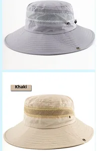 Detail view of khaki and grey outdoor hats featuring breathable mesh and metal buttons