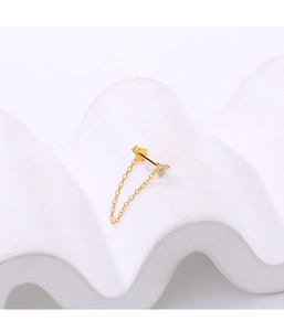 Detailed close-up of 925 silver chain tassel flower earring with gold finish and zircons