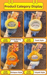 Detail of plush cat keychains featuring shrimp, toast, and octopus snack-themed hats