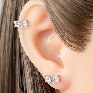 Elegant silver bow stud earrings with clear crystals and matching ear bone clip on model