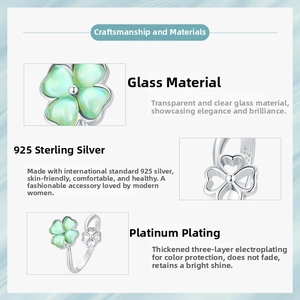 Detail view of S925 sterling silver four-leaf clover ring with green glass and S925 hallmark