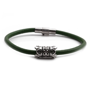 Dark green braided leather bracelet with vintage silver hollow patterns and magnetic clasp