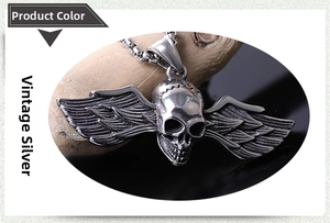 Macro shot of gothic winged skull pendant with vintage silver finish and rustic texture