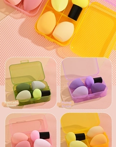 Set of four makeup sponges in different shapes with a transparent storage case