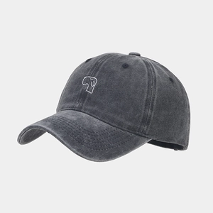 Detail of embroidered puppy on vintage washed charcoal grey soft top baseball cap